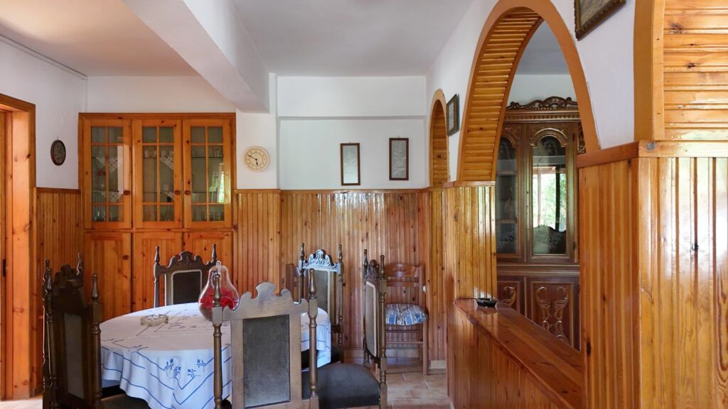 Two-bedroom ground floor apartment with a spacious plot & within walking distance to the beach in Kalyves