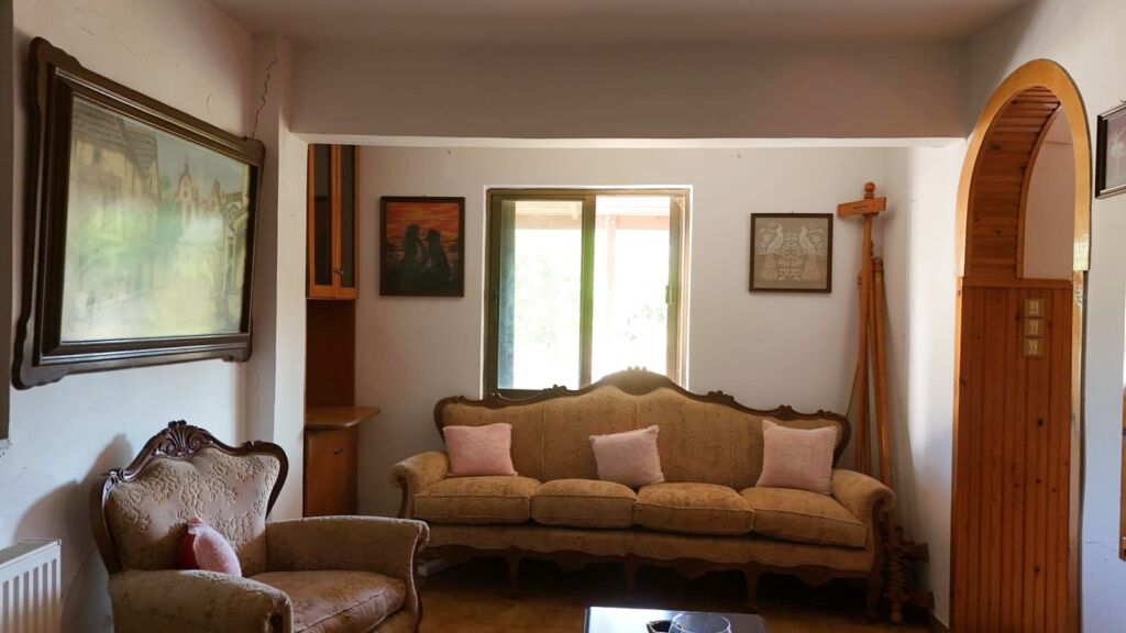 Two-bedroom ground floor apartment with a spacious plot & within walking distance to the beach in Kalyves