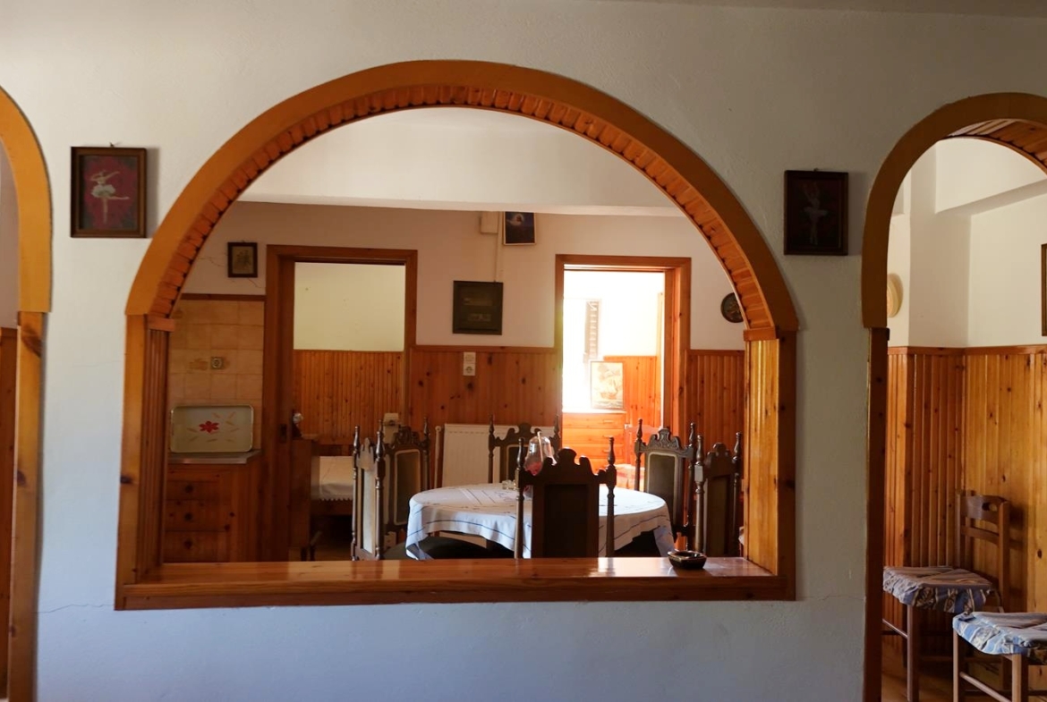 Two-bedroom ground floor apartment with a spacious plot & within walking distance to the beach in Kalyves
