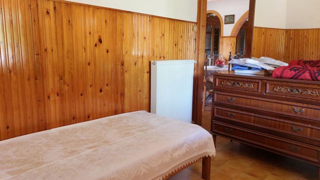 Two-bedroom ground floor apartment with a spacious plot & within walking distance to the beach in Kalyves