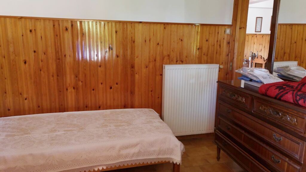 Two-bedroom ground floor apartment with a spacious plot & within walking distance to the beach in Kalyves