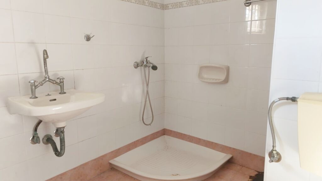 Two-bedroom ground floor apartment with a spacious plot & within walking distance to the beach in Kalyves