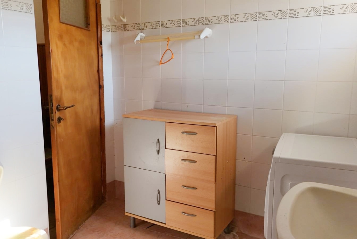 Two-bedroom ground floor apartment with a spacious plot & within walking distance to the beach in Kalyves