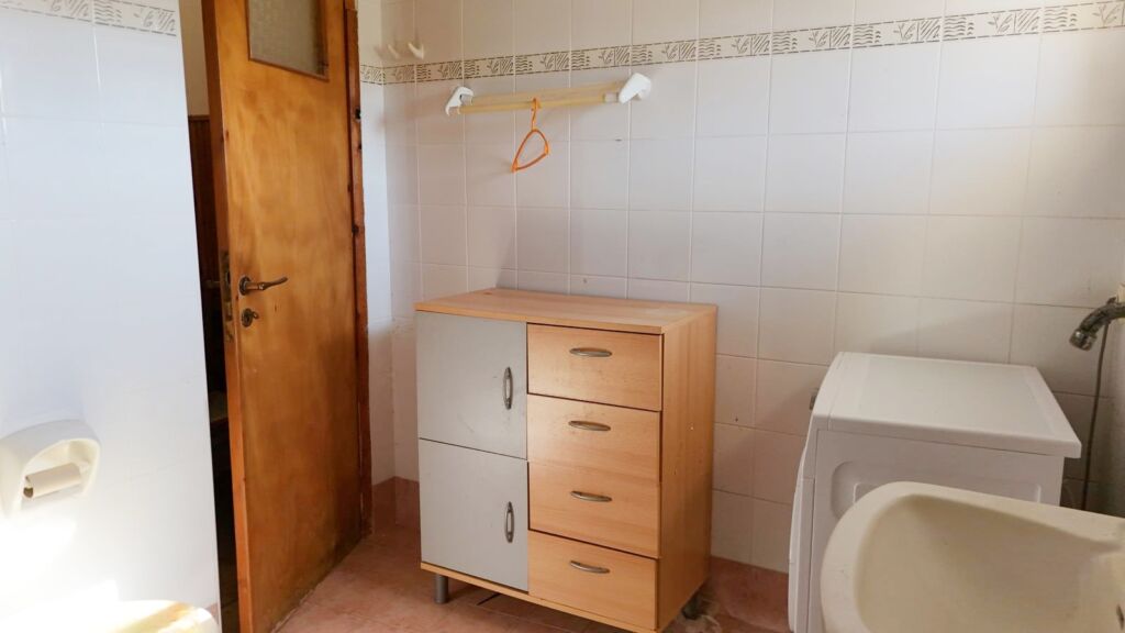 Two-bedroom ground floor apartment with a spacious plot & within walking distance to the beach in Kalyves