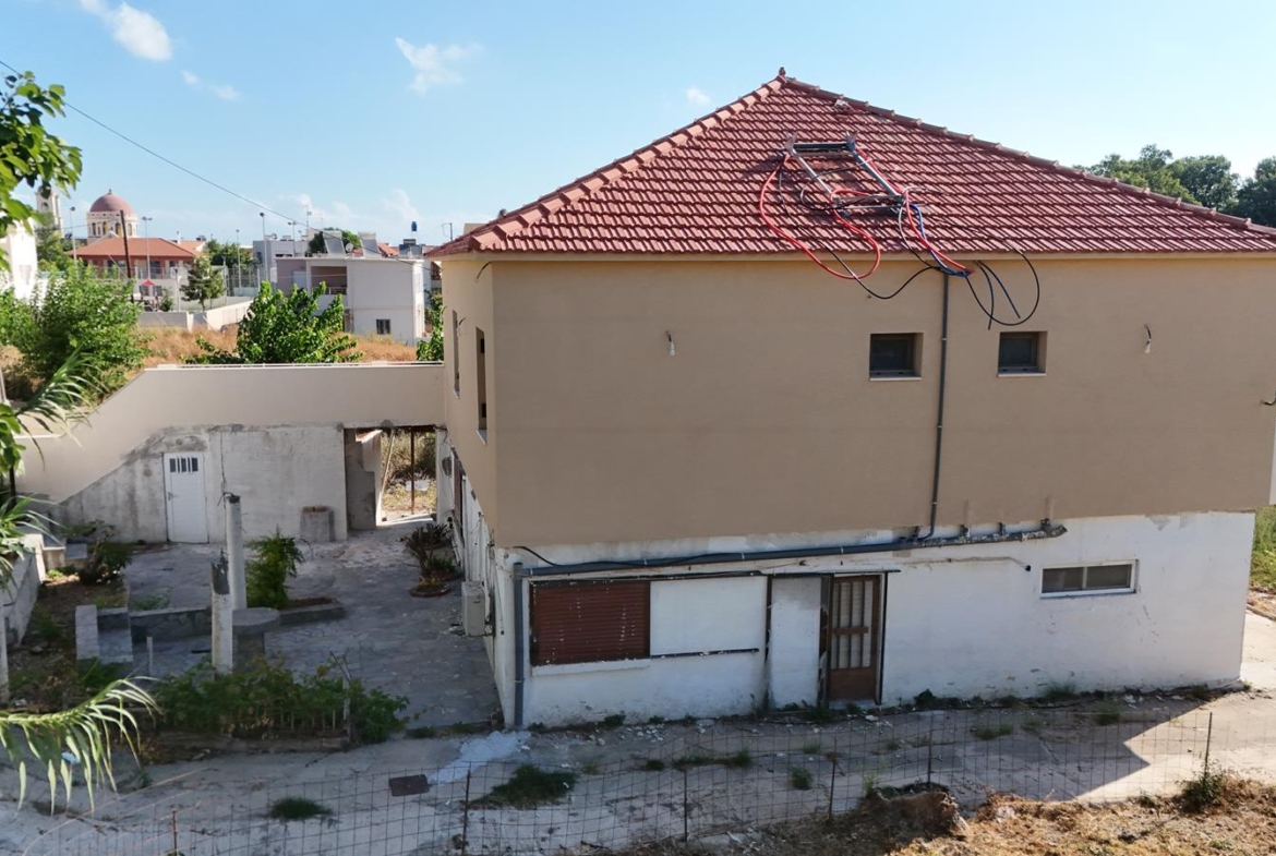 Two-bedroom ground floor apartment with a spacious plot & within walking distance to the beach in Kalyves