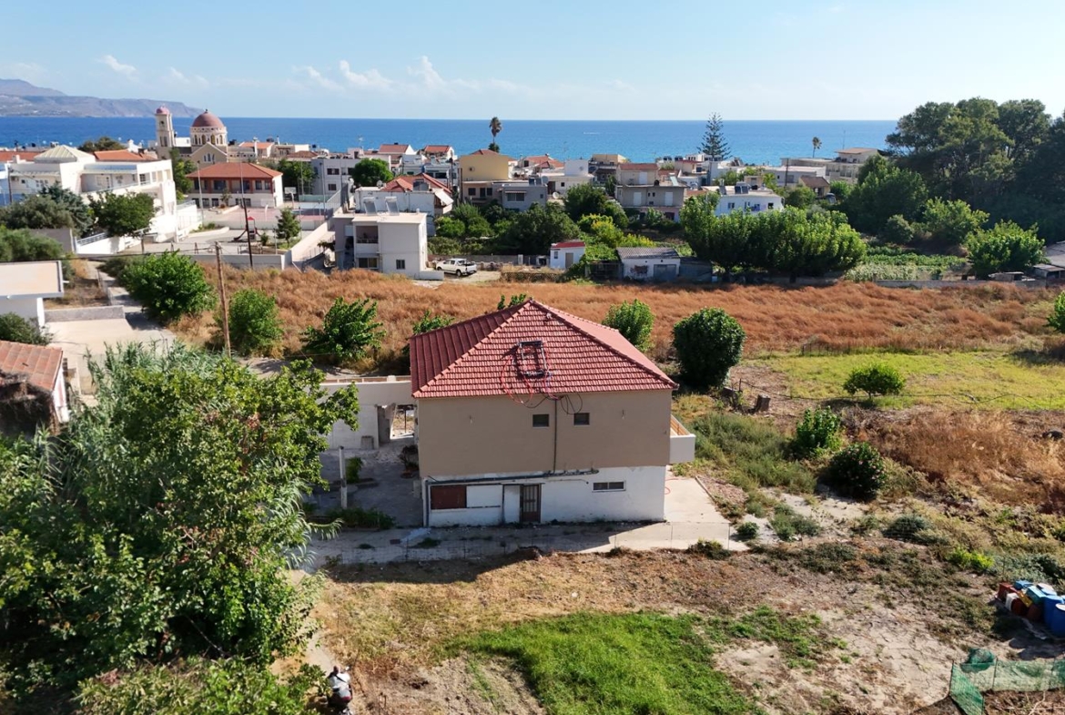 Two-bedroom ground floor apartment with a spacious plot & within walking distance to the beach in Kalyves