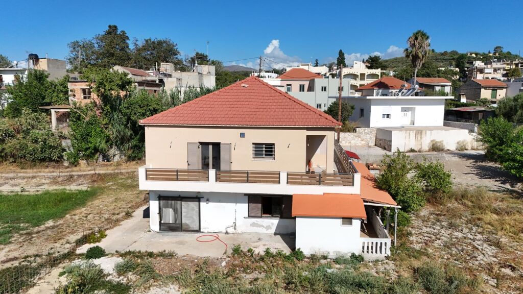 Two-bedroom ground floor apartment with a spacious plot & within walking distance to the beach in Kalyves