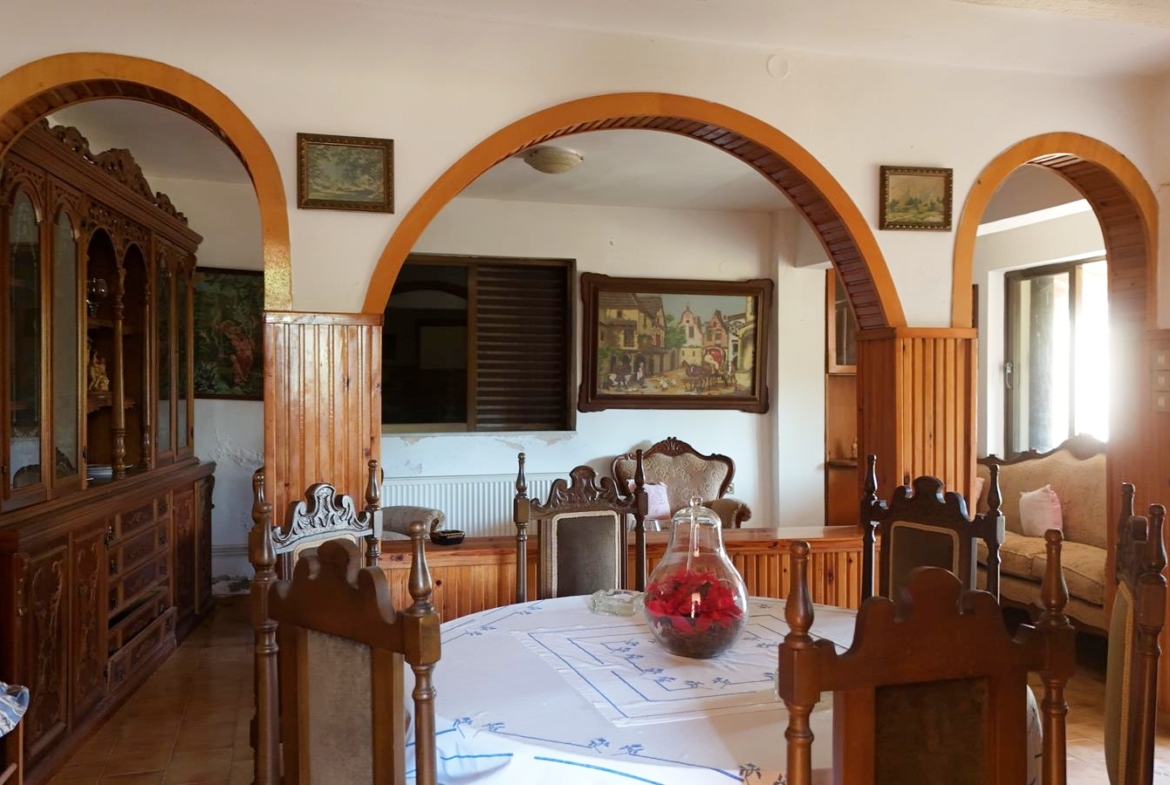Two-bedroom ground floor apartment with a spacious plot & within walking distance to the beach in Kalyves