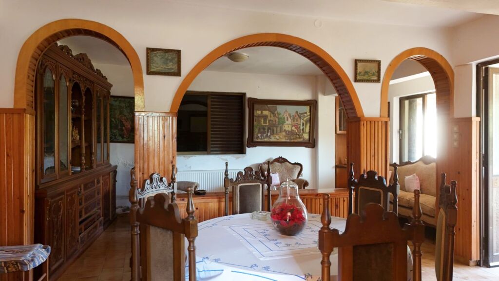 Two-bedroom ground floor apartment with a spacious plot & within walking distance to the beach in Kalyves