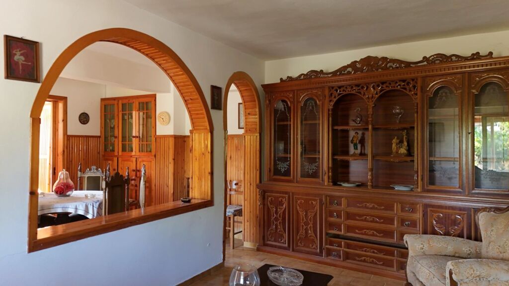 Two-bedroom ground floor apartment with a spacious plot & within walking distance to the beach in Kalyves