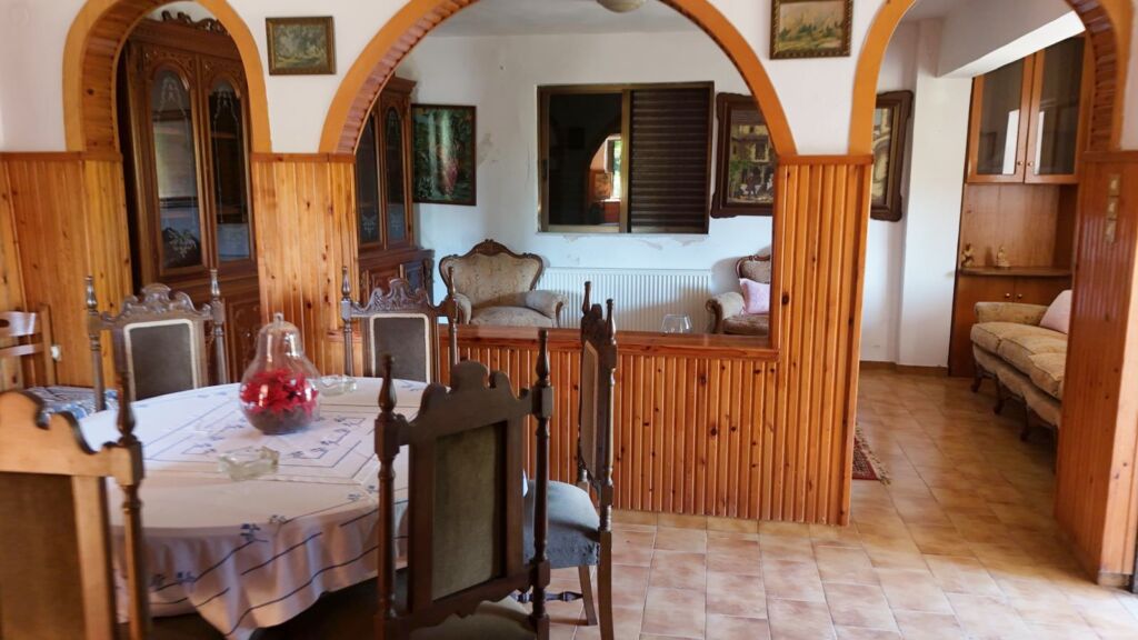 Two-bedroom ground floor apartment with a spacious plot & within walking distance to the beach in Kalyves