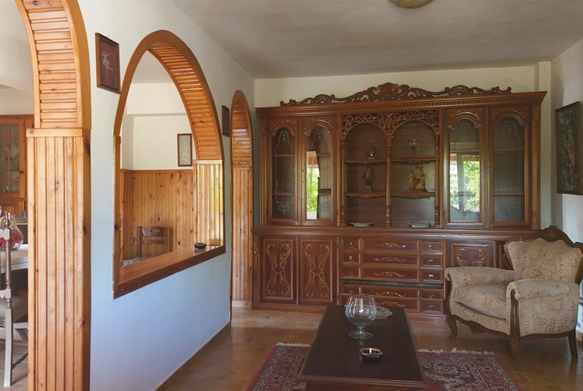 Two-bedroom ground floor apartment with a spacious plot & within walking distance to the beach in Kalyves