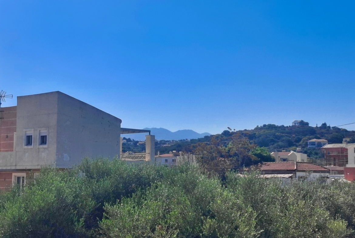 Beachfront one-bedroom apartment with White Mountains view in Almyrida