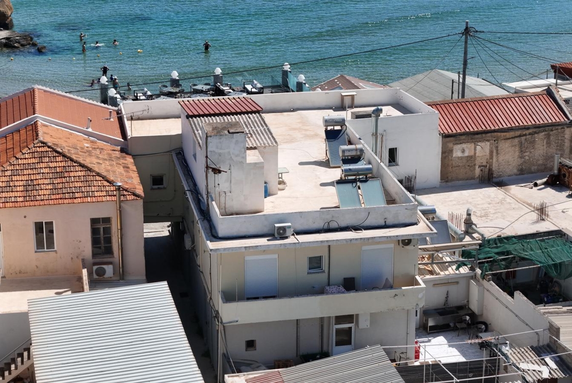 Beachfront one-bedroom apartment with White Mountains view in Almyrida