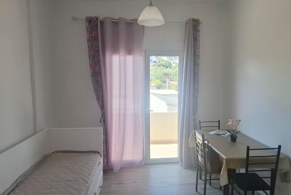 Beachfront one-bedroom apartment with White Mountains view in Almyrida