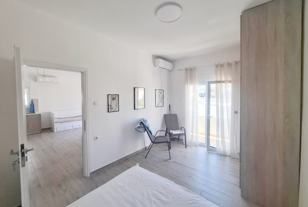 Beachfront one-bedroom apartment with White Mountains view in Almyrida
