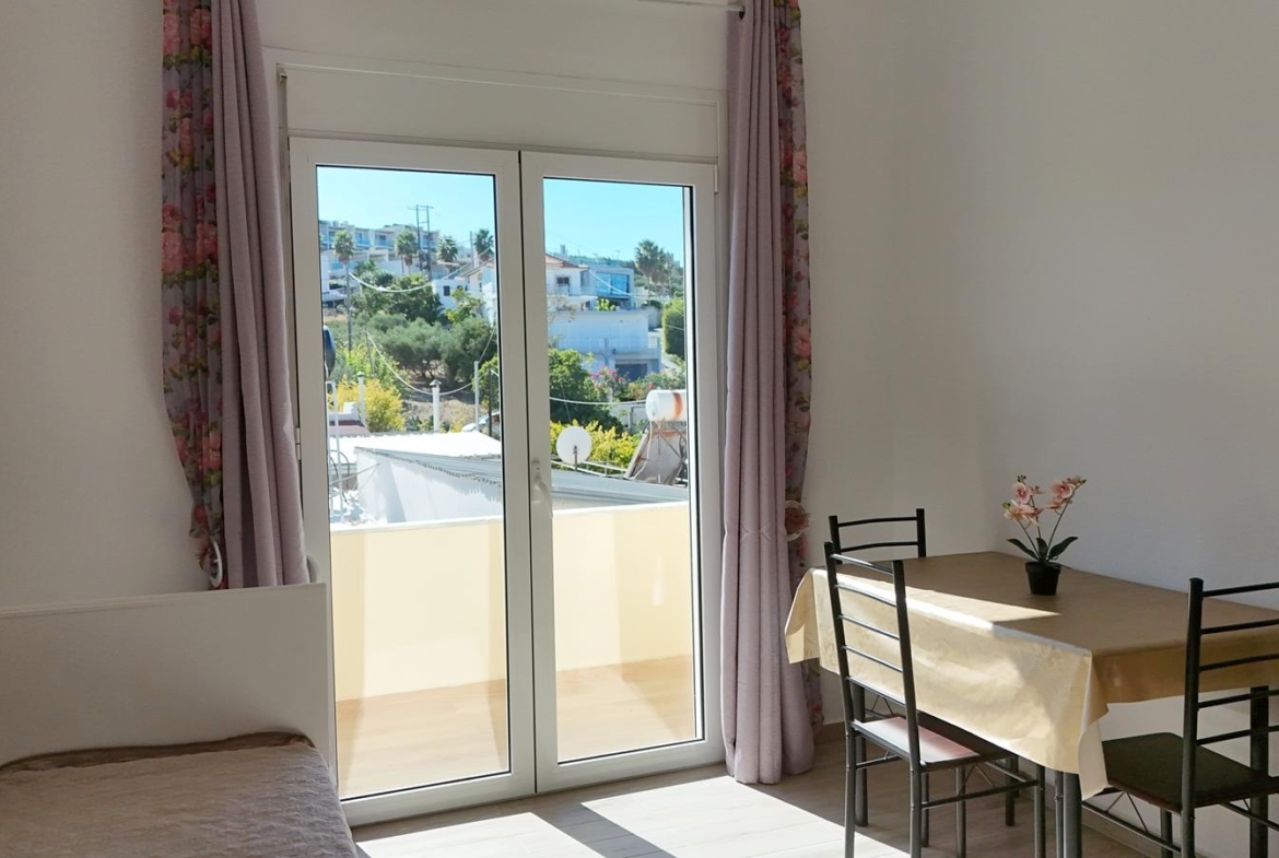 Beachfront one-bedroom apartment with White Mountains view in Almyrida