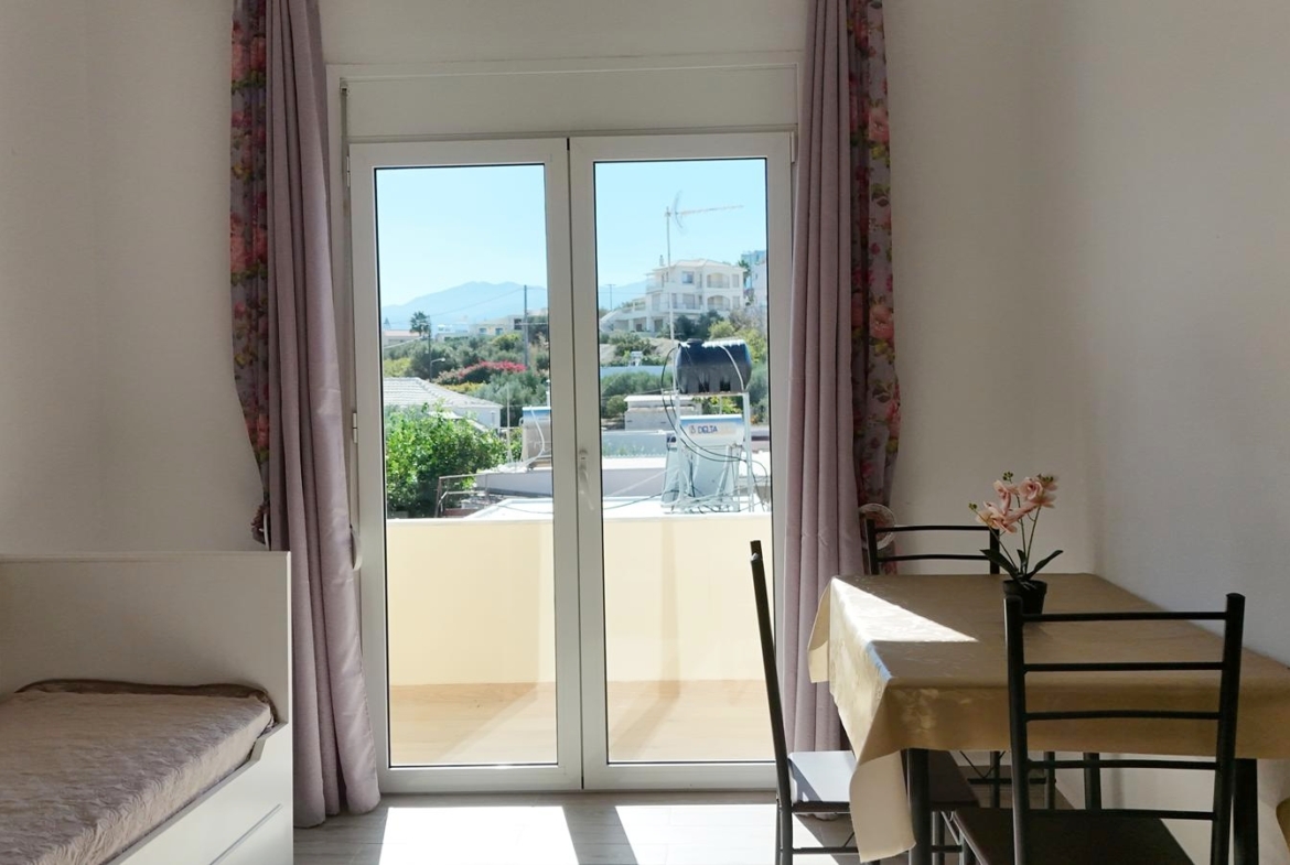 Beachfront one-bedroom apartment with White Mountains view in Almyrida