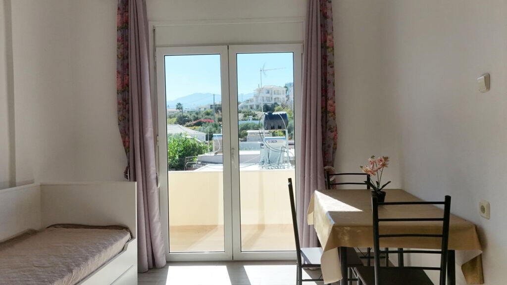 default Beachfront one-bedroom apartment with White Mountains view in Almyrida