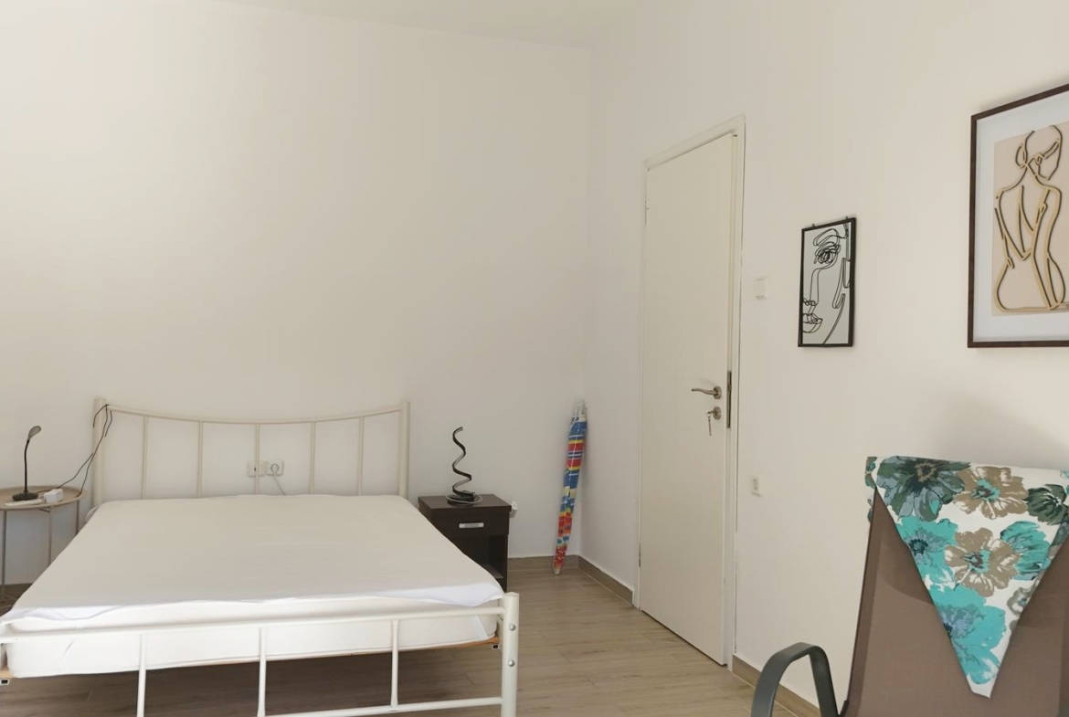 Beachfront one-bedroom apartment with White Mountains view in Almyrida