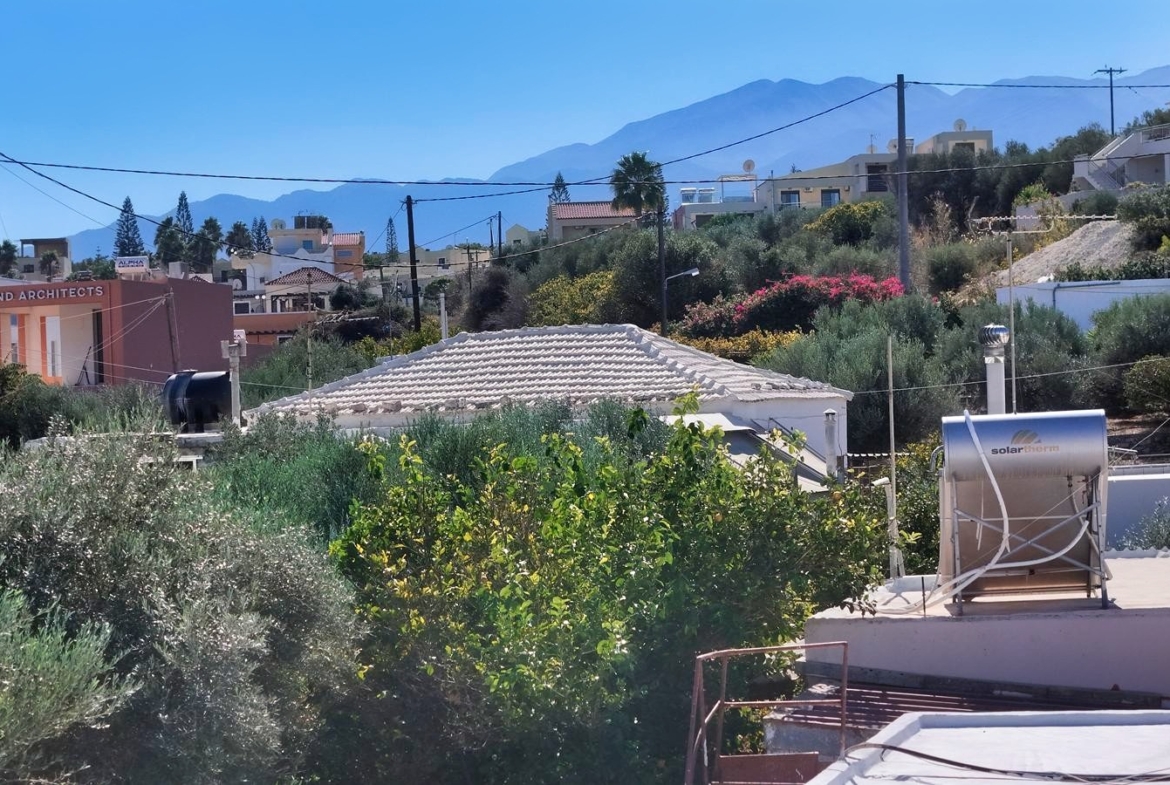 Beachfront one-bedroom apartment with White Mountains view in Almyrida