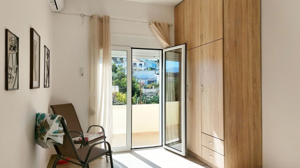 default Beachfront one-bedroom apartment with White Mountains view in Almyrida