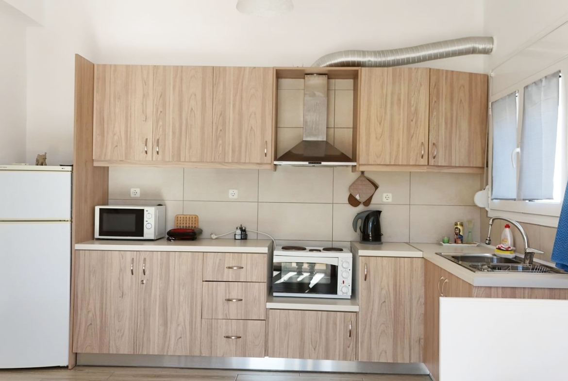 Beachfront one-bedroom apartment with White Mountains view in Almyrida