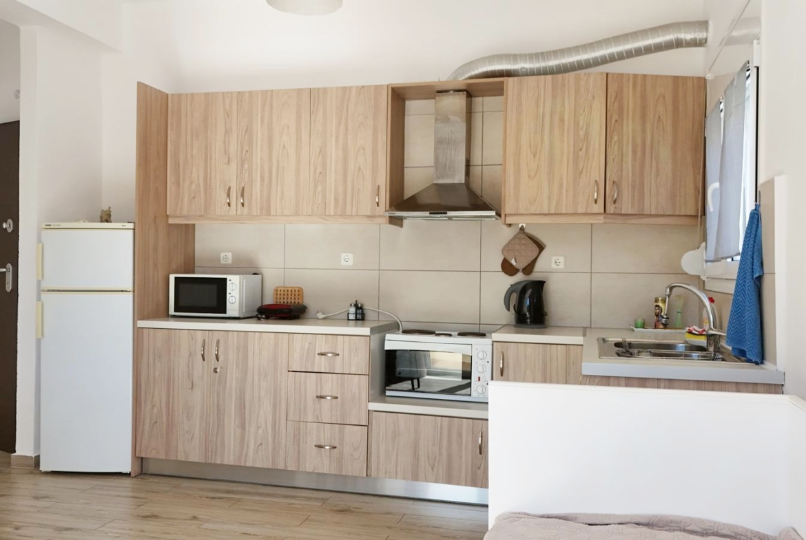 Beachfront one-bedroom apartment with White Mountains view in Almyrida
