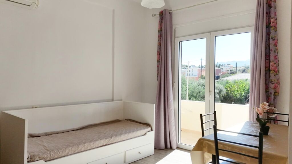 default Beachfront one-bedroom apartment with White Mountains view in Almyrida