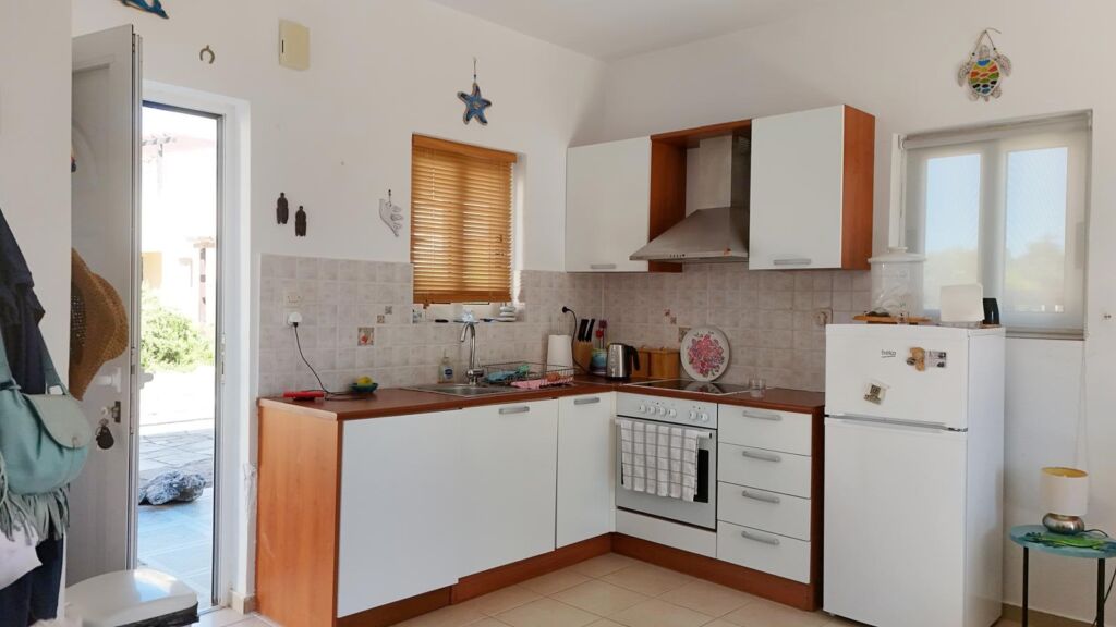default Two-bedroom house with a shared pool in Drapanos