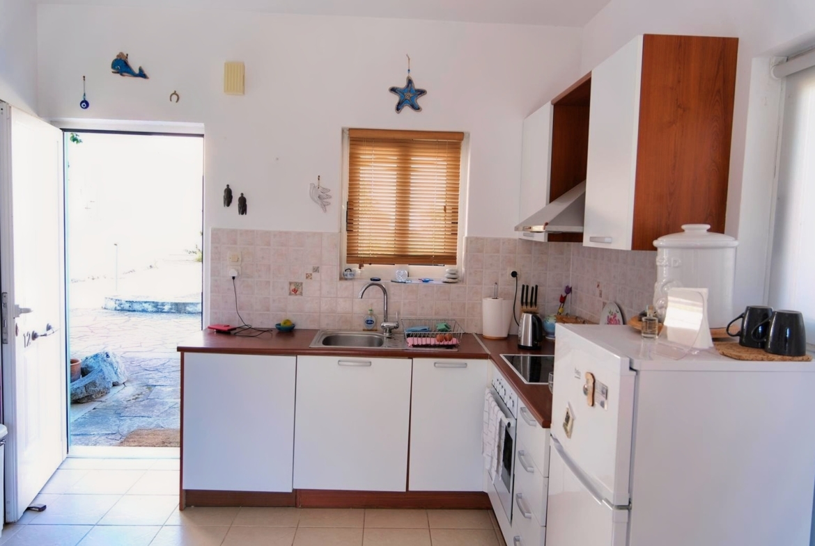Two-bedroom house with a shared pool in Drapanos