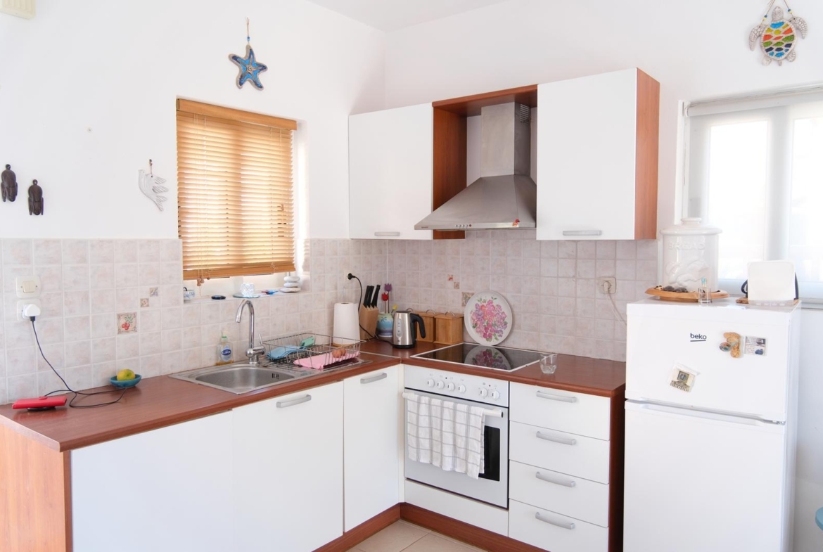Two-bedroom house with a shared pool in Drapanos
