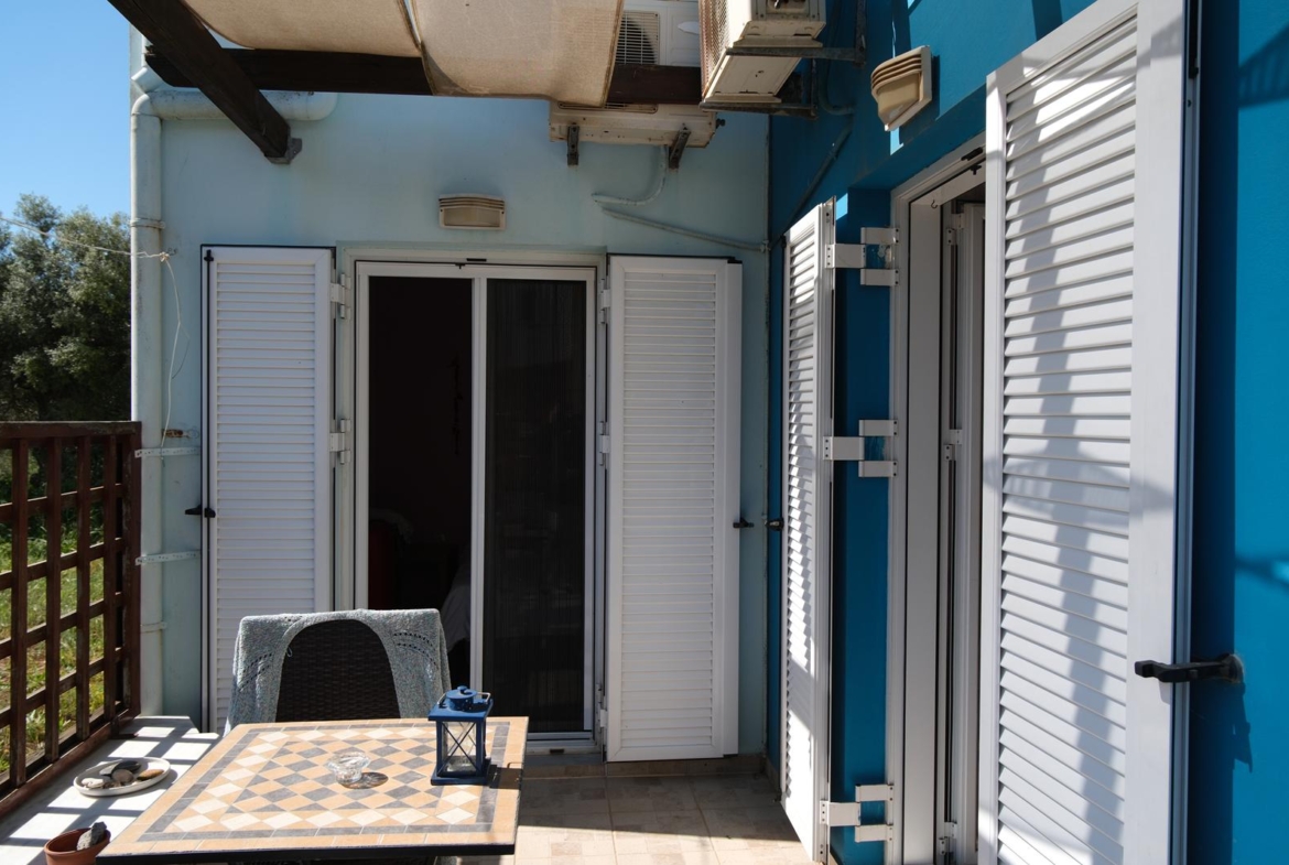 Two-bedroom house with a shared pool in Drapanos