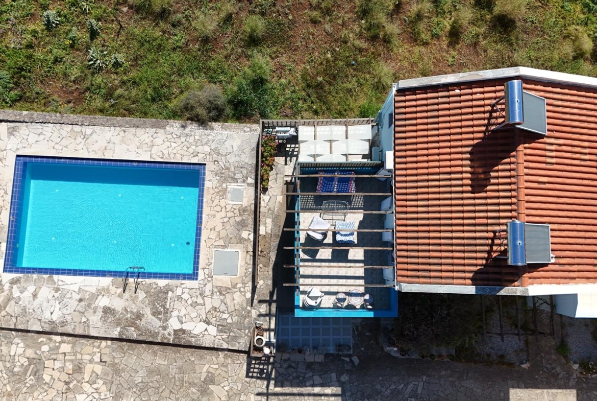 Two-bedroom house with a shared pool in Drapanos