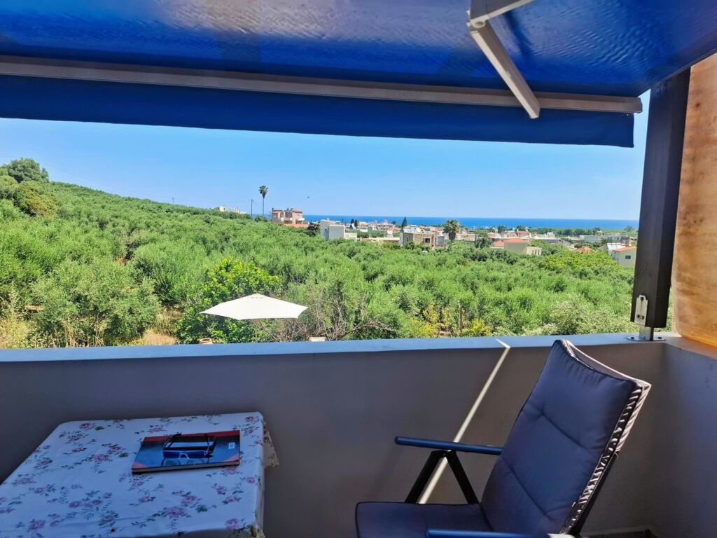 13 Second floor one-bedroom apartment with a sea view & shared pool in Tavronitis