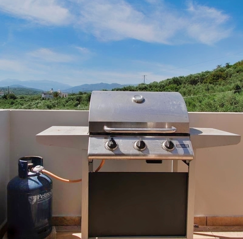 Second floor one-bedroom apartment with a sea view & shared pool in Tavronitis