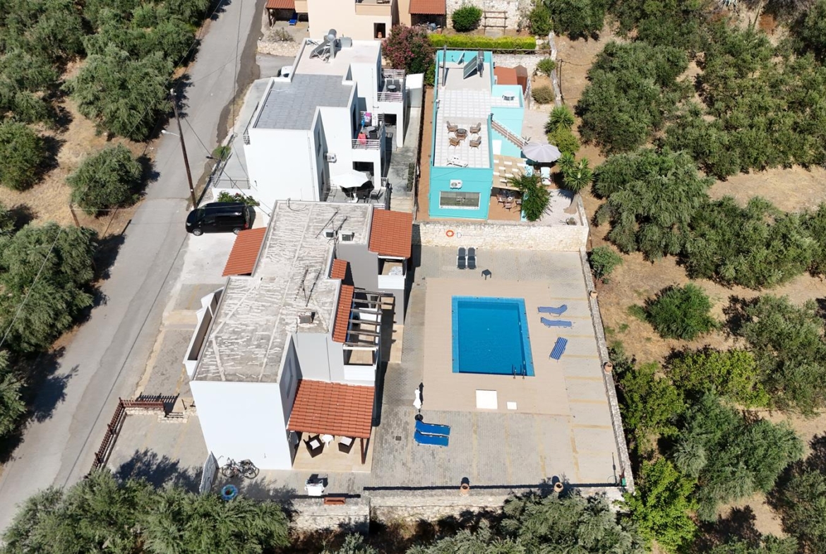 Second floor one-bedroom apartment with a sea view & shared pool in Tavronitis