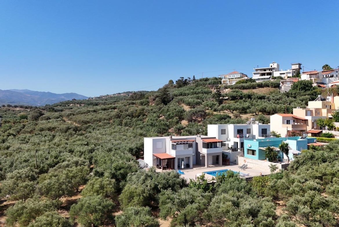 Second floor one-bedroom apartment with a sea view & shared pool in Tavronitis