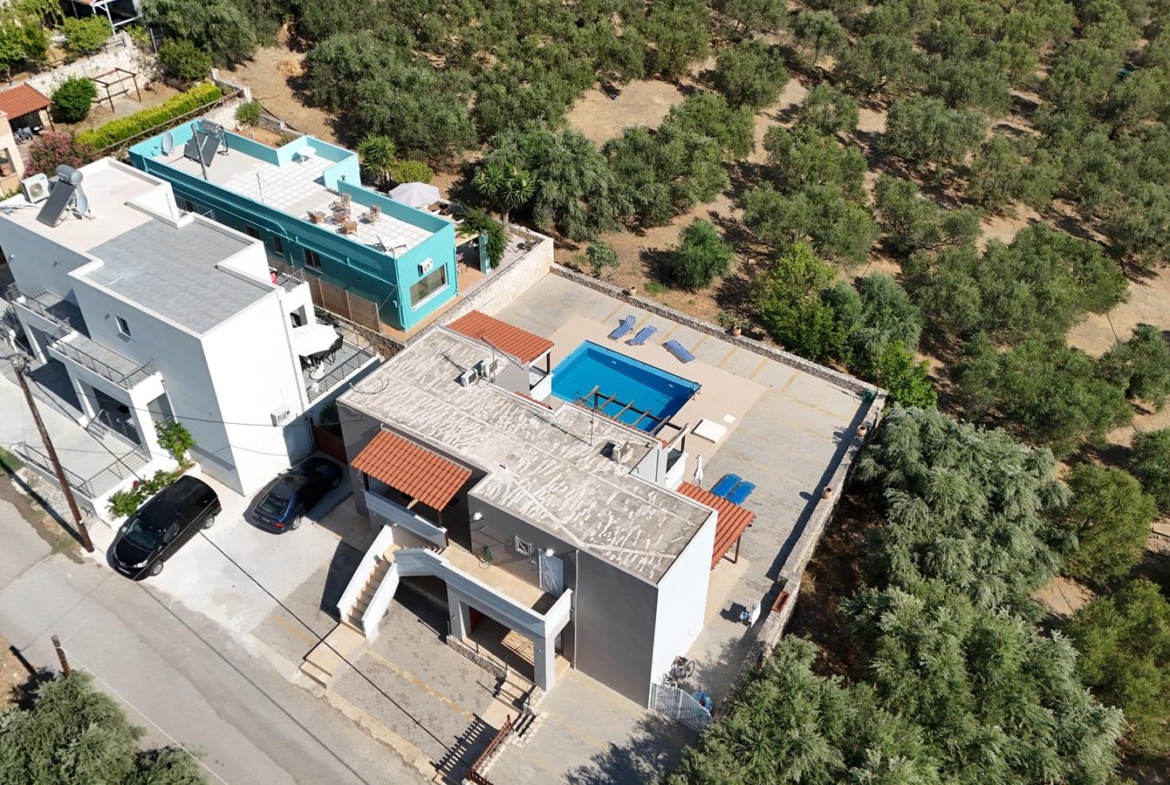 Second floor one-bedroom apartment with a sea view & shared pool in Tavronitis